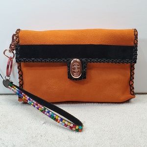 Orange suede clutch